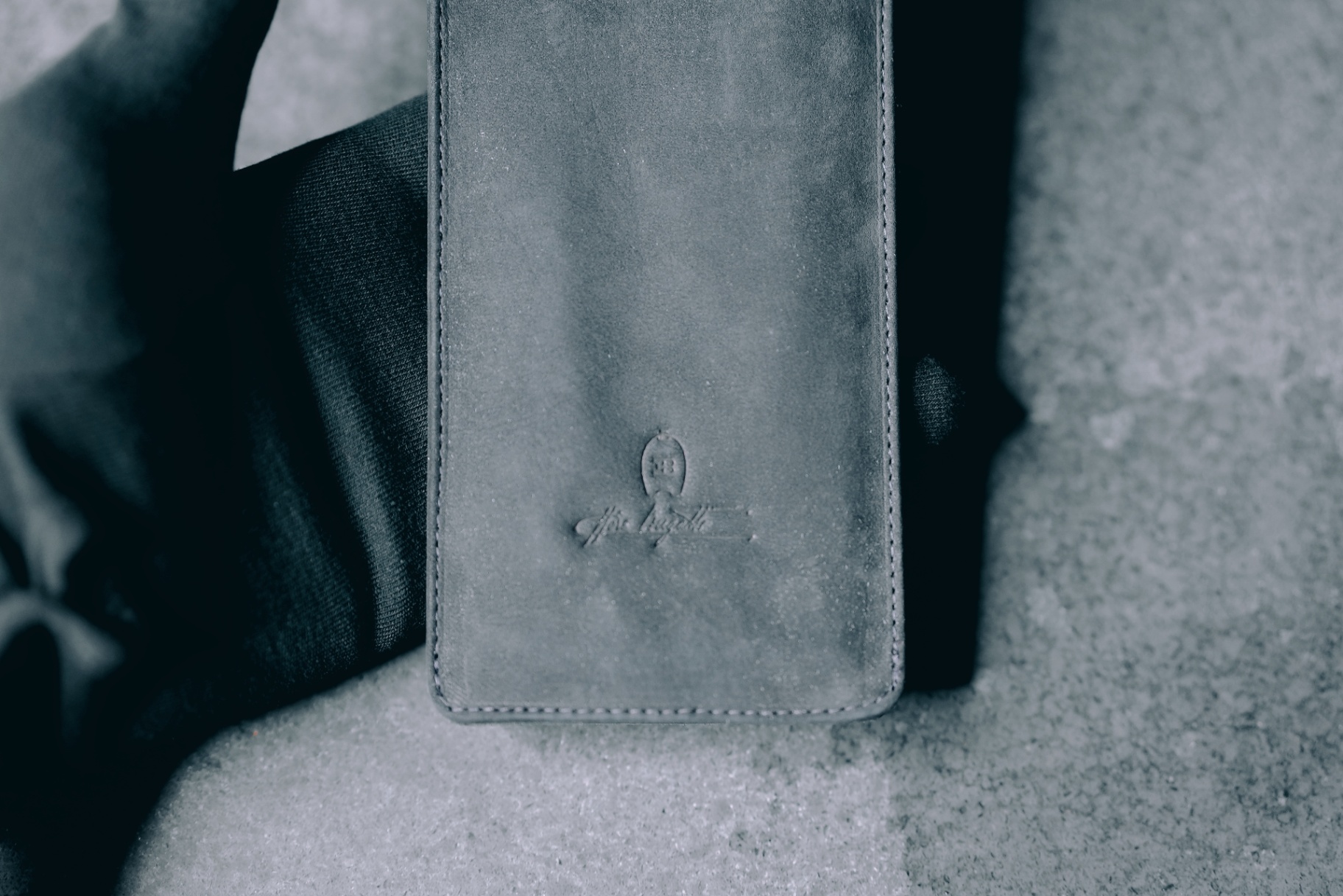 Leather pouch with embossed Bugatti logo