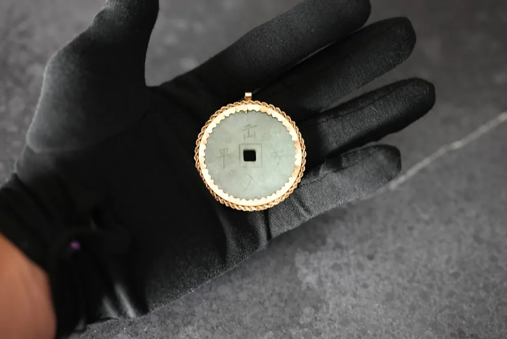 Carved Jade Disc Pendant in Gold Bezel — Pendant · Yellow Gold